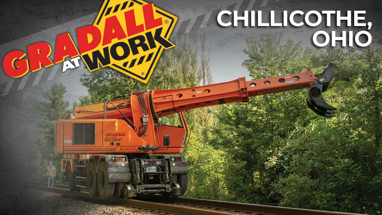 With grapple attachment,  XL 4130 V handles MOW  jobs efficiently